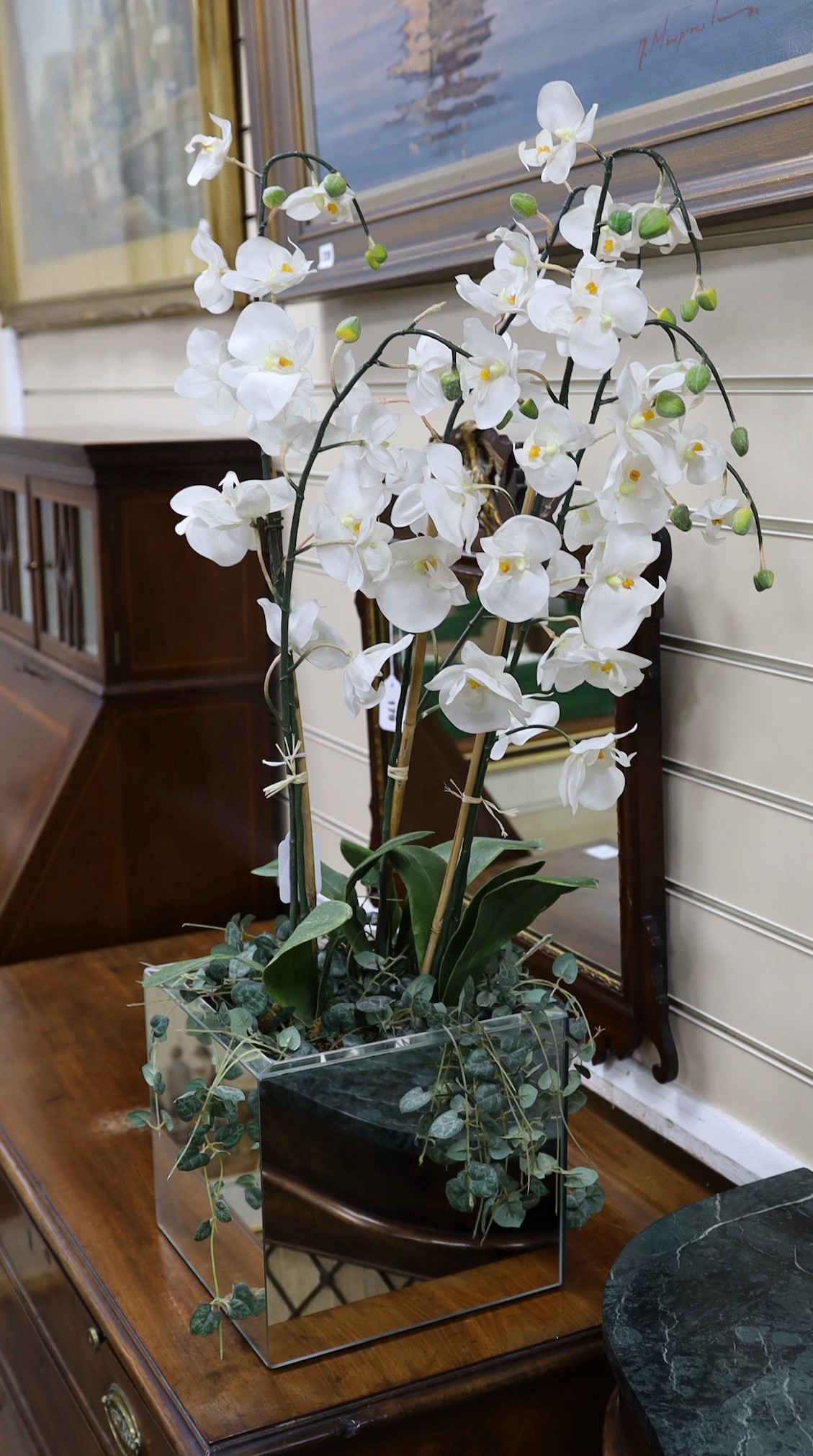 A display of tall white silk orchids in mirrored planter, approx 82cm